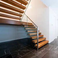 Escalier flottant moderne en acier à poutres invisibles pour villa et appartement, avec rampe en verre, escalier métallique de luxe sur mesure