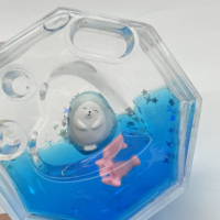 Presse-papiers multifonctionnel en forme d'hexagone, papeterie liquide colorée avec flotteurs mignons, porte-stylo décoratif fantaisie en forme de dauphin