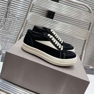 Sneakers décontractées unisexes en cuir véritable à semelle souple et lacets, chaussures décontractées de luxe de marque de mode de haute qualité - Product Image 1