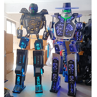 Guangzhou Enjoyment Accessoires de costume personnalisés pour performance sur échasses pour adultes, avec robot LED lumineux, pour discothèque, carnaval et fête