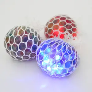 Boule de fruits en filet à LED, fidget sensoriels, soulagement du Stress, boule de compression en maille, jouet pour enfants adultes