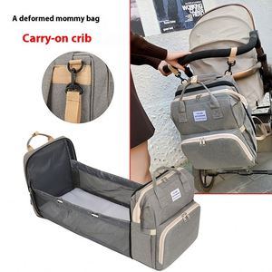 Mochila de nailon impermeable para mujer al por mayor con cierre de cremallera y cinturón con amortiguación de aire, bolsa de viaje para madres en movimiento, cuna portátil para bebé - Product Image 3