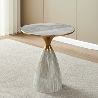 Table basse en fer moderne et minimaliste de luxe léger avec plateau en marbre ; finition épaissie aspect pierre pour salon, hôtel, maison
