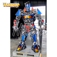 LED Işıklı Gerçek Boyutlu Beyaz Asker Heykeli Büyük Optimus Prime Heykeli Robot Modeli Dönüşebilen Hurda Metal Heykel