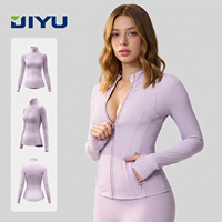 Veste de sport respirante couleur pêche pour femme, col montant, coupe ajustée, en spandex et polyester, avec poches zippées pour la course et la gym