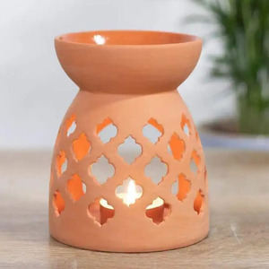Quemador de Aceite de Arcilla Terracota con Diseño de Cuatro Hojas - Product Image 3