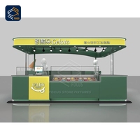 Comptoir de service en bois et verre pour bar à café haut de gamme, vitrine à gâteaux et comptoir de caisse