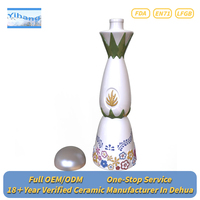 Récipient en porcelaine de tequila fait à la main avec logo personnalisé design artisanal de fleurs colorées bouteille d'alcool vide en céramique