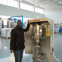 Emballeur de liquide automatique modèle XY de marque KOYO/machines à eau koyo/machine de remplissage et de scellage d'eau de sachet koyo