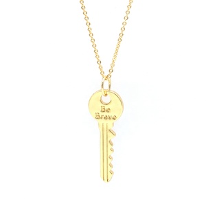Collar con diseño de llave para mujer, colgante chapado en oro de 18k con dije de Be Brave - Product Image 1
