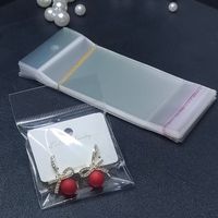 Sacs en plastique transparents auto-adhésifs OPP avec trou de suspension pour l'affichage de bijoux en magasin