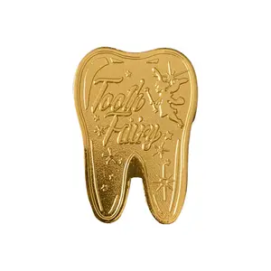 The Tooth Fairy THE BANK OF FAIRY FINANCES ONE TOOTH LUCKY COIN