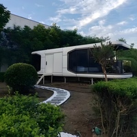 Capsule spatiale moderne personnalisée de luxe pour le tourisme culturel et créatif, idéale pour le glamping, les séjours à domicile, les bureaux et les espaces mobiles extérieurs