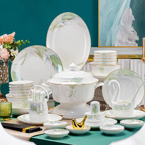 Service de table en porcelaine fine européenne, motif incrusté d'or, design élégant feuille verte, compatible micro-ondes et lave-vaisselle, marque Alfa >10L - Product Image 1