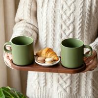 Vente en gros de tasses à café en céramique de couleur unie simple, tasse en céramique verte mate avec logo personnalisé