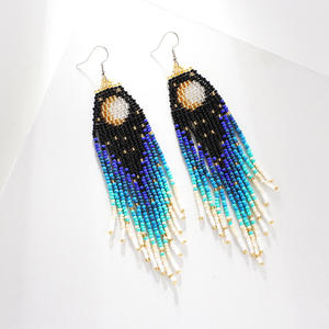 Bijoux bohèmes faits à la main pour femmes mode BOHO lune étoile conception goutte frangée gland Miyuki graines de riz perles boucles d'oreilles - Product Image 1
