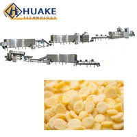 Ligne de production automatique de céréales pour le petit-déjeuner, machine extrudeuse à double vis pour la fabrication de flocons de maïs et de céréales croustillantes