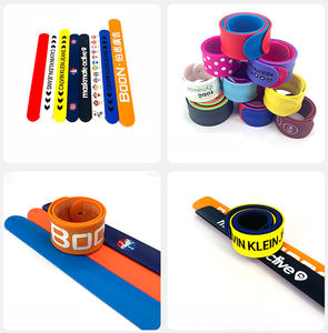 ขายส่งคุณภาพสูงโลโก้ที่กําหนดเอง 3D PVC สแน็ปสายรัดข้อมือไม้บรรทัดclapสร้อยข้อมือซิลิโคนตบสายรัดข้อมือตบสร้อยข้อมือ - Product Image 5