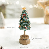 Mini-Weihnachtsbaumfigur aus Kunstharz, schneebeflockt, Tisch-Weihnachtsbaum mit Schleife und Sternbasis für die Weihnachtsdekoration zu Hause oder auf dem Schreibtisch.
