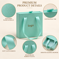 En stock, boîte cadeau de 10 cm x 3,5 cm x 10 cm avec poignée en ruban et logo personnalisé pour bijoux, bagues, boucles d'oreilles et colliers