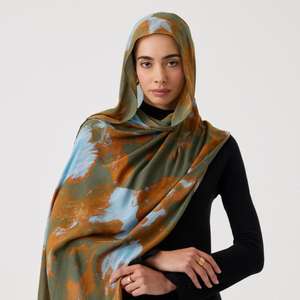 ผ้าคลุมศีรษะมุสลิมพิมพ์ลายสำหรับผู้หญิง รุ่นขายดีประจำปี 2026 พร้อมโลโก้สั่งทำได้ ขายส่ง ระบายอากาศได้ดี ใช้ได้ทุกฤดู สวยสง่า เรียบร้อย ผลิตจากผ้าโมดอล - Product Image 1