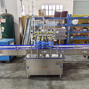 <span class=keywords><strong>Macchina</strong></span> riempitrice rotante a pressione negativa automatica in acciaio inossidabile riempitrice di riempimento di succo di Vodka Whisky riempitrice di liquidi - Product Image 3