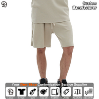 Shorts décontractés pour hommes, coupe ample, style streetwear, avec cordon de serrage, taille élastique, respirants, en tissu gaufré, mi-cuisse, pour l'été