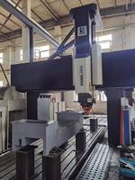 Fraiseuse CNC portique 6028 d'occasion à faible nombre d'heures de fonctionnement pour le fraisage lourd de grandes structures métalliques