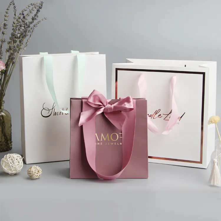 China Hersteller personal isierte Luxus Boutique Geschenk beutel Verpackung benutzer definierte rosa Papier danke Geschenk beutel mit Logo-Druck