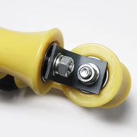 Dispositif de guidage d'ascenseur moderne RBC pour chaîne de compensation de fosse avec roue 90x59 jaune, usage hôtelier