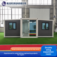 Conteneur de maison préfabriquée pliable à double aile de 20 pieds, espace de vie mobile et détachable, grande surface extensible de haute qualité