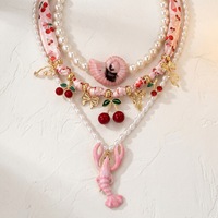 Collier pendentif homard rose Y2K SongYi, ras-de-cou perlé épais, coquillage marin original, nœud cerise