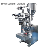 Prix de la machine d'emballage automatique de petits sachets de céréales de noix et de dattes Machine d'emballage de sachets de fruits secs par pesée verticale pour petites entreprises