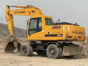 Excavatrice sur pneus Hyundai 210W d'occasion de haute qualité, 21 tonnes, avec attache rapide, brise-roche et tarière, certifiée CE, Daewoo - Product Image 4