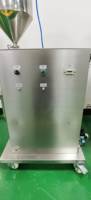 Machine de remplissage semi-automatique manuelle à seringue en plastique pour crème cosmétique visqueuse en gel préremplie