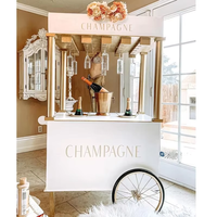 Chariot de présentation de bonbons élégant en PVC blanc, grande capacité, sur roulettes, pour événements de mariage et desserts, avec design polyvalent