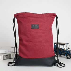 Sac à cordon en toile de coton durable avec base en PU robuste pour usage quotidien, décontracté pour les trajets et le shopping, avec patch de marque vintage - Product Image 1