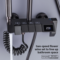 Pommeau de douche en céramique et acier inoxydable pressurisé à quatre vitesses, avec jets doux, finition noir mat, design touches de piano