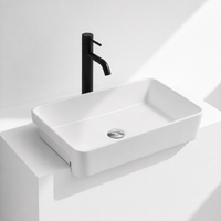 Lavabo semi-suspendu en céramique pour le lavage des mains, lavabo semi-encastré pour hôtels et usage domestique