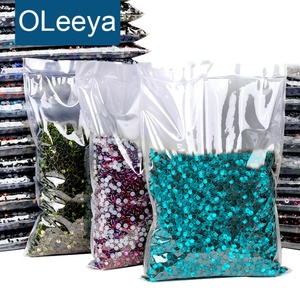 Strass thermocollants DMC de qualité supérieure Oleeya, vente en gros directe d'usine, SS6-SS30, 1 kg, cristaux de transfert thermique pour vêtements et loisirs créatifs - Product Image 1
