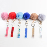 Porte-clés pompon en Silicone PU, alarme, auto-défense, avec pompon, vente en gros
