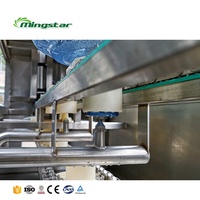 Machine de remplissage d'eau pure distillée 300bph 450bph pour grandes bouteilles en polycarbonate de 20 litres et 5 gallons