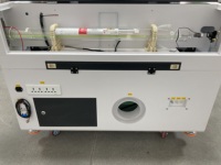 Máquina de grabado corte láser de CO2 Tounjen 7050 con refrigeración por agua control Ruida para acrílico madera papel piedra
