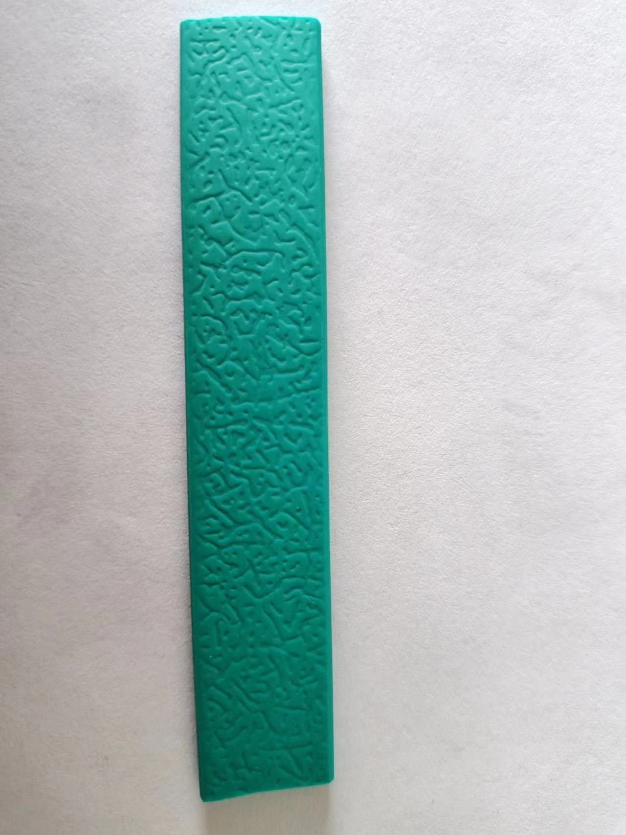 embossed emerald green