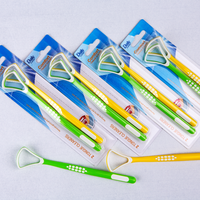 Vente en gros de grattoir pour langue en silicone en plastique
