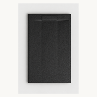Receveur de douche architectural noir H1 BMC avec drain linéaire dissimulé, surface en pierre texturée, antidérapant classe C et dos renforcé