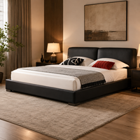 Lit moderne écologique en cuir noir rembourré avec tête de lit capitonnée et design plateforme