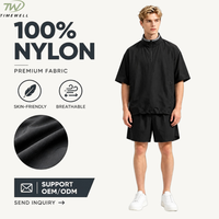 Ensemble 2 pièces d'été pour hommes en nylon, haut à col montant zippé à quart de tour et manches courtes, coupe ample, short de sport d'extérieur, vente en gros OEM faible MOQ