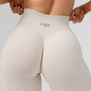 Leggings de yoga pour femme taille haute sans couture couleur unie avec logo, effet push-up et rehaussement des fesses, sportifs, longueur intégrale - Product Image 1