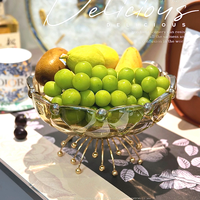 Assiette de fruits simple de style européen pour l'organisation de la maison Présentoir de fruits secs sur la table basse du salon Plats et assiettes